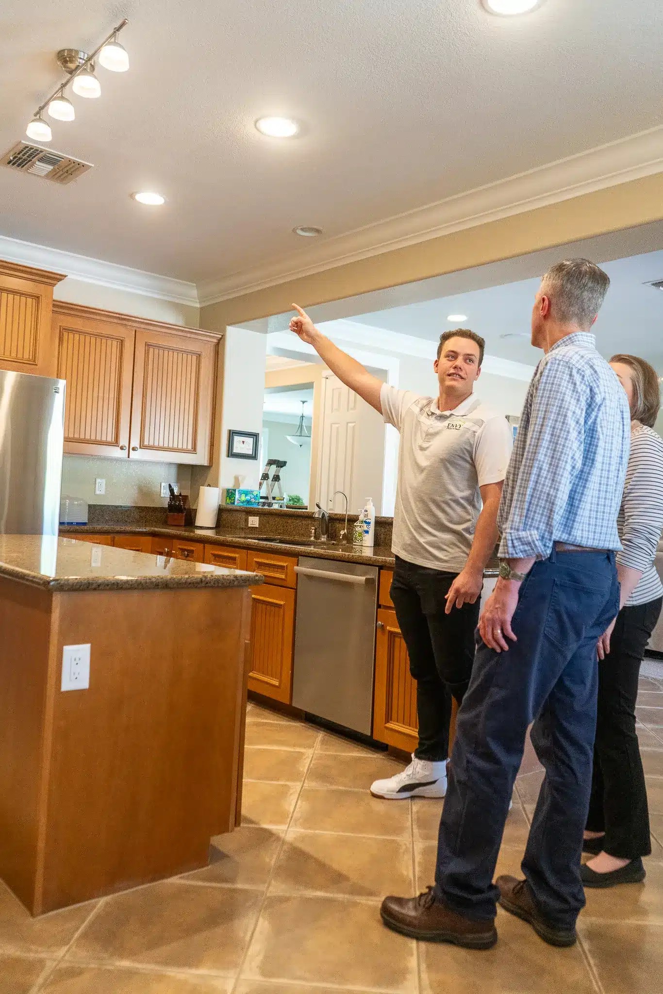 envy homes representative guiding homeowners in energy audit
