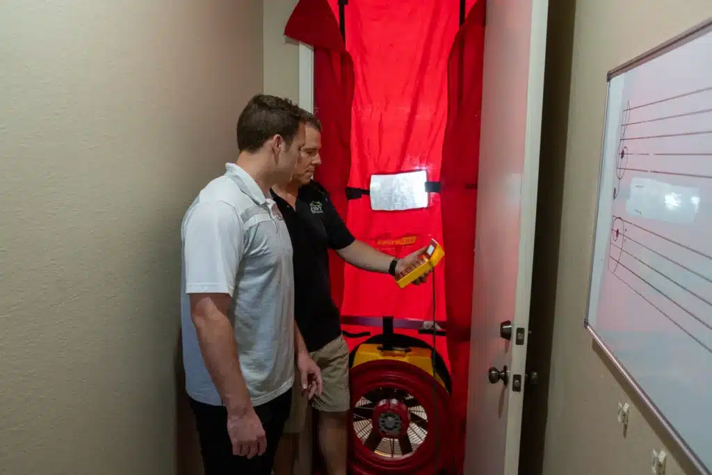 blower door test during a home energy efficiency audit